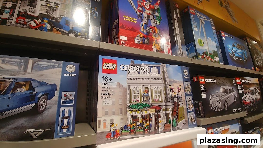 Shelves filled with diverse LEGO sets, including Creator, Technic, and Expert series, in a retail store.