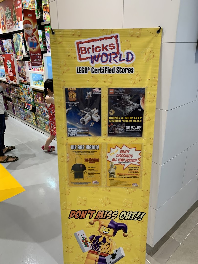 A vibrant yellow Bricks World LEGO Certified Store banner promoting offers and job openings.