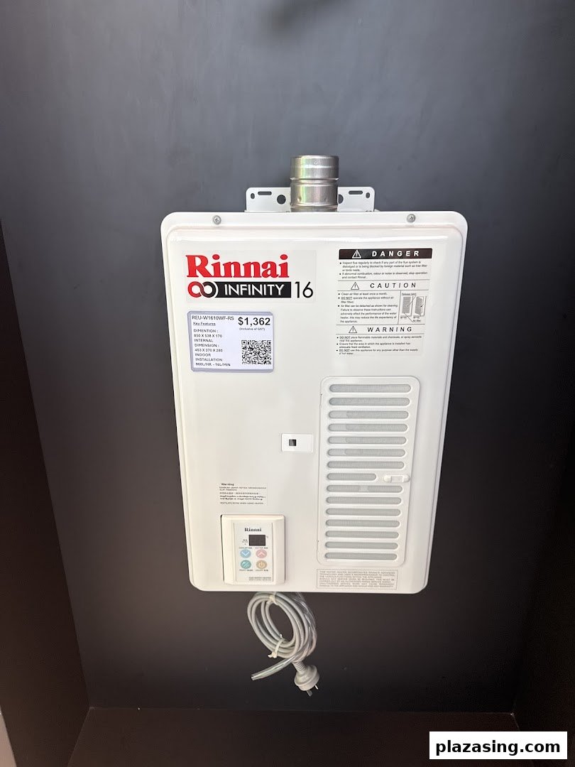 A Rinnai Infinity 16 water heater displayed on a dark wall.