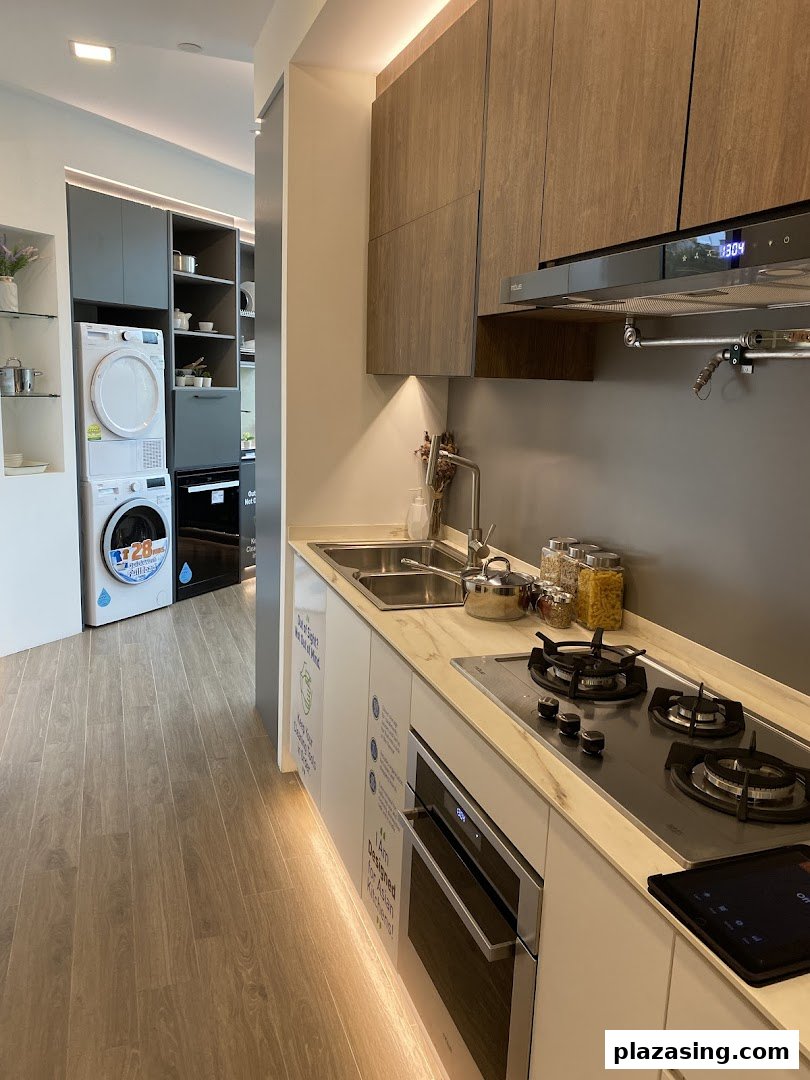 A modern kitchen and laundry appliance display showcasing integrated home solutions.
