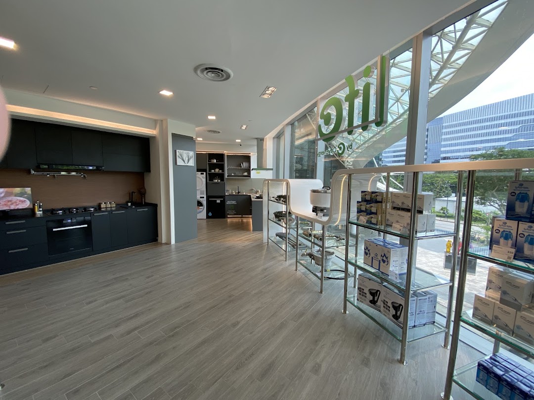 A modern showroom featuring kitchen displays, home appliances, and energy solutions.
