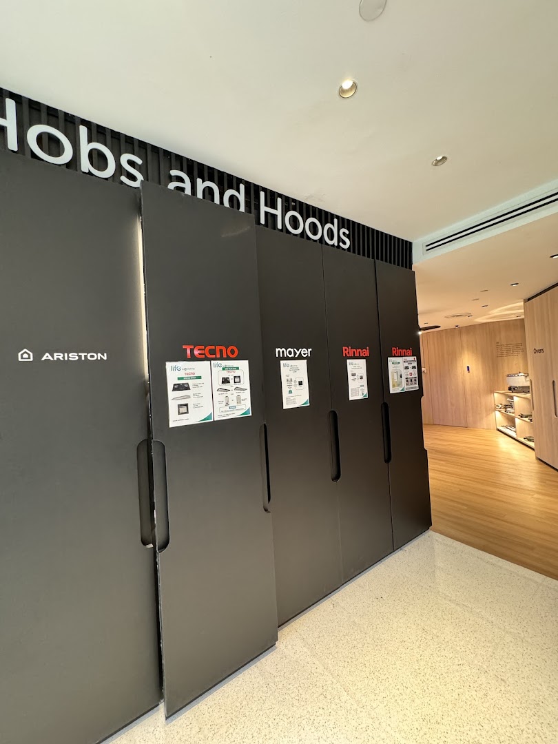 An interior view of Life by City Energy showcasing kitchen hobs and hoods from various brands.