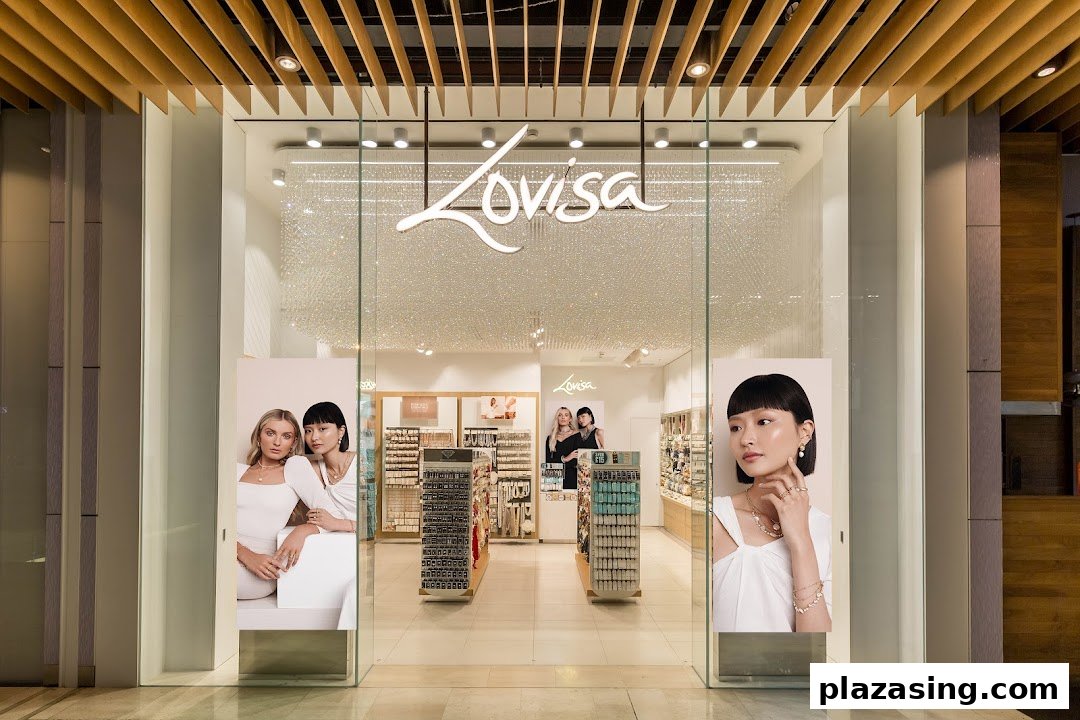 The Lovisa shop entrance features a prominent logo, sparkling ceiling, and large display windows showcasing jewelry and models.