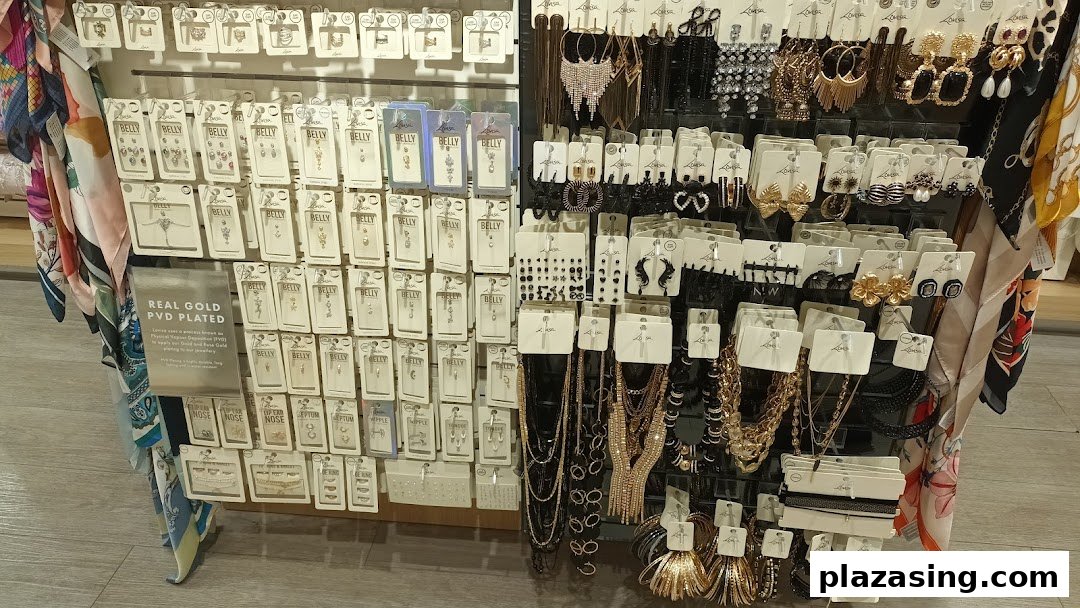 A vibrant display of diverse fashion jewelry, including earrings, necklaces, and body piercings, at Lovisa.