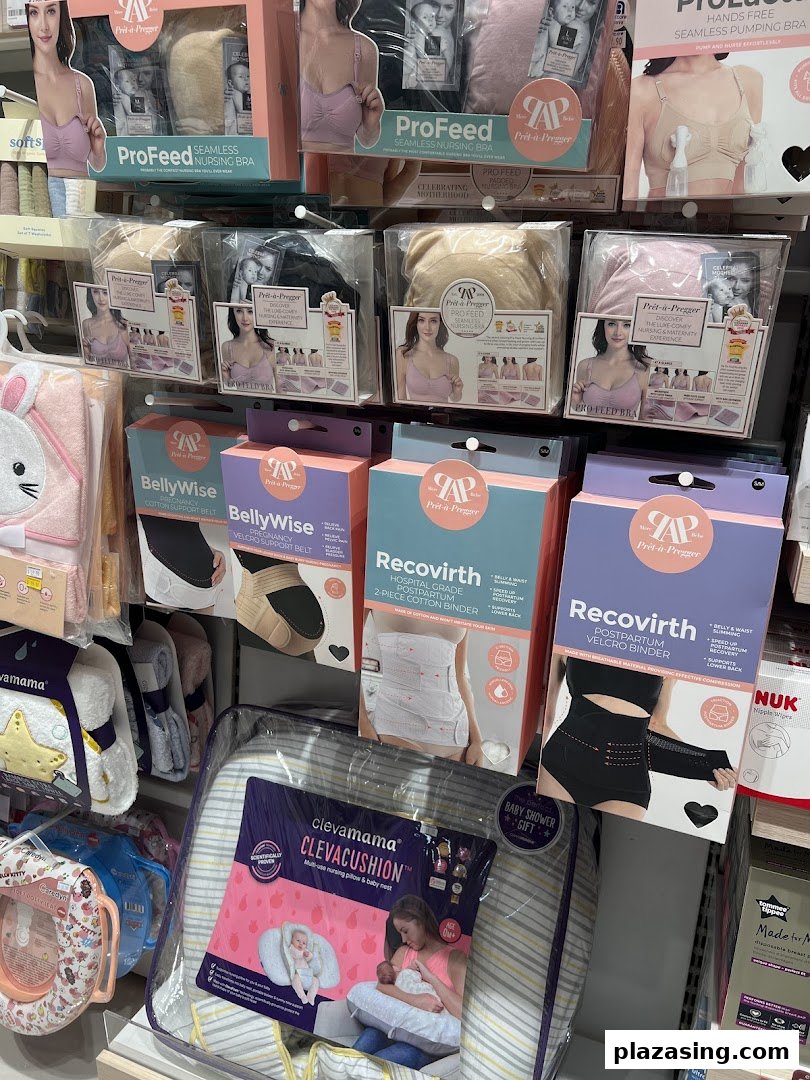 A display of maternity and baby products, including nursing bras, support belts, and nursing pillows.