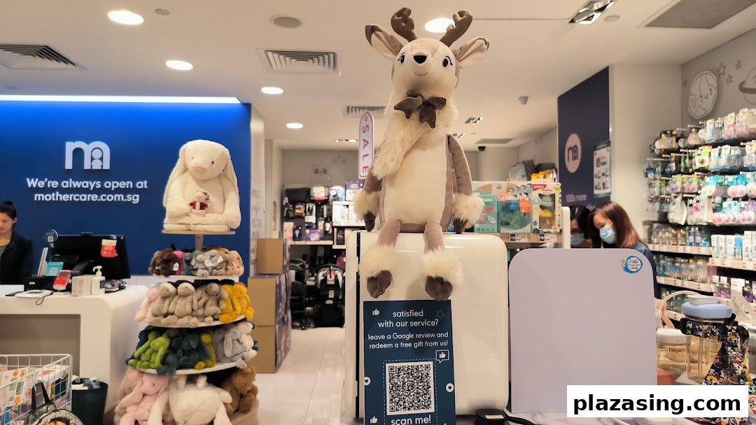 Interior view of Mothercare, showcasing baby products, plush toys, and a welcoming atmosphere.