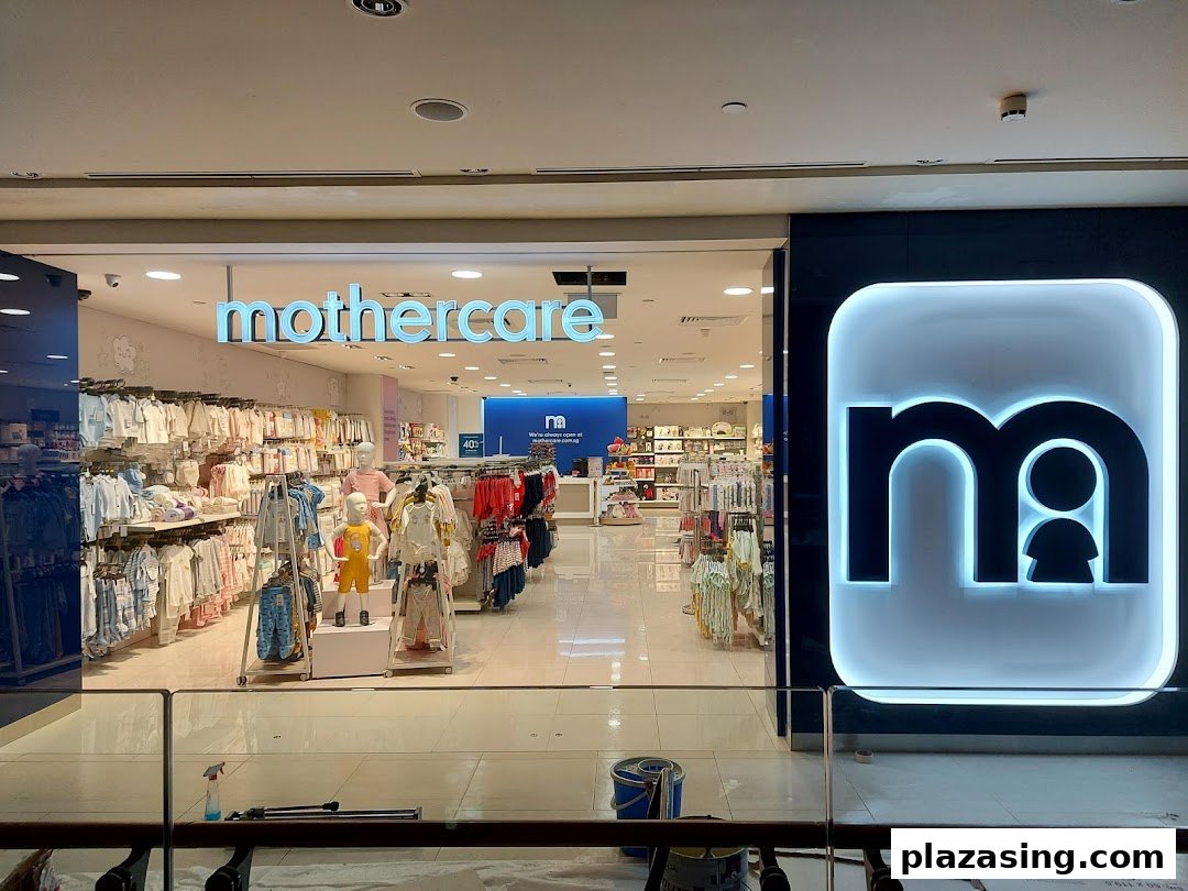 The brightly lit entrance of Mothercare, showcasing a wide array of baby and children's clothing and essentials.