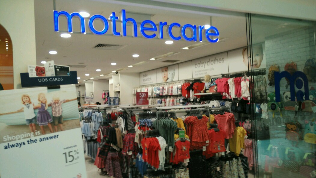 Mothercare shop entrance displaying baby clothes, essentials, and promotional offers.