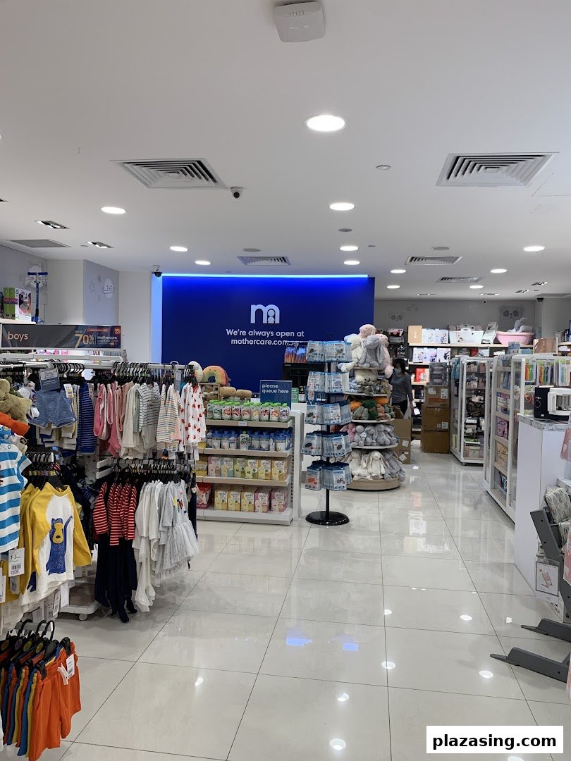 Brightly lit interior of Mothercare, showcasing baby clothes, feeding essentials, and various children's products.