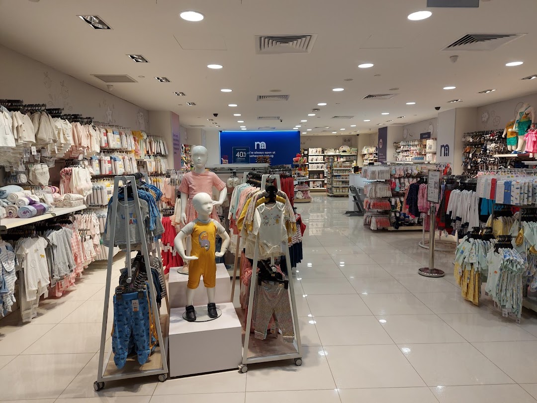Interior view of Mothercare, showcasing a wide range of baby and children's apparel and products.