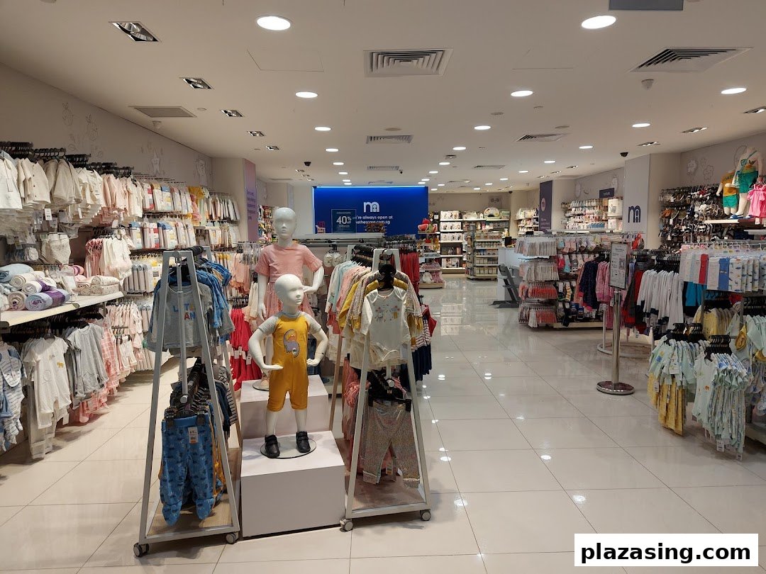 Interior view of Mothercare, showcasing a wide range of baby and children's apparel and products.