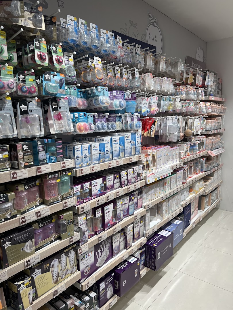 Shelves at Mothercare stocked with a wide range of baby feeding bottles, pacifiers, and accessories.