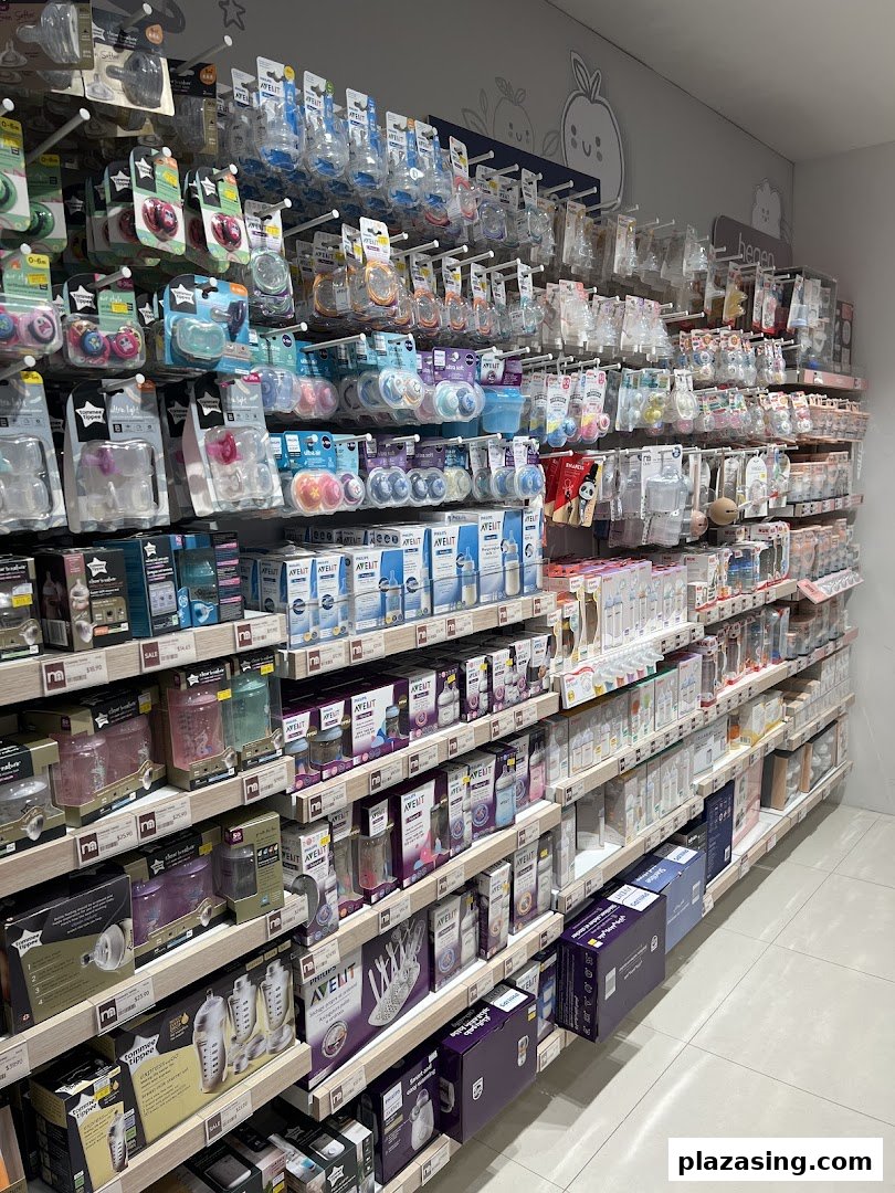 Shelves at Mothercare stocked with a wide range of baby feeding bottles, pacifiers, and accessories.