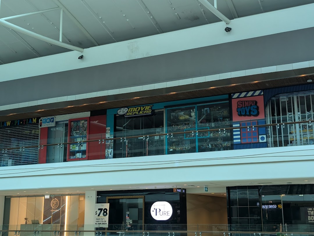 The storefront of Movie Replicas Collection and Simply Toys on an upper level of a shopping mall.