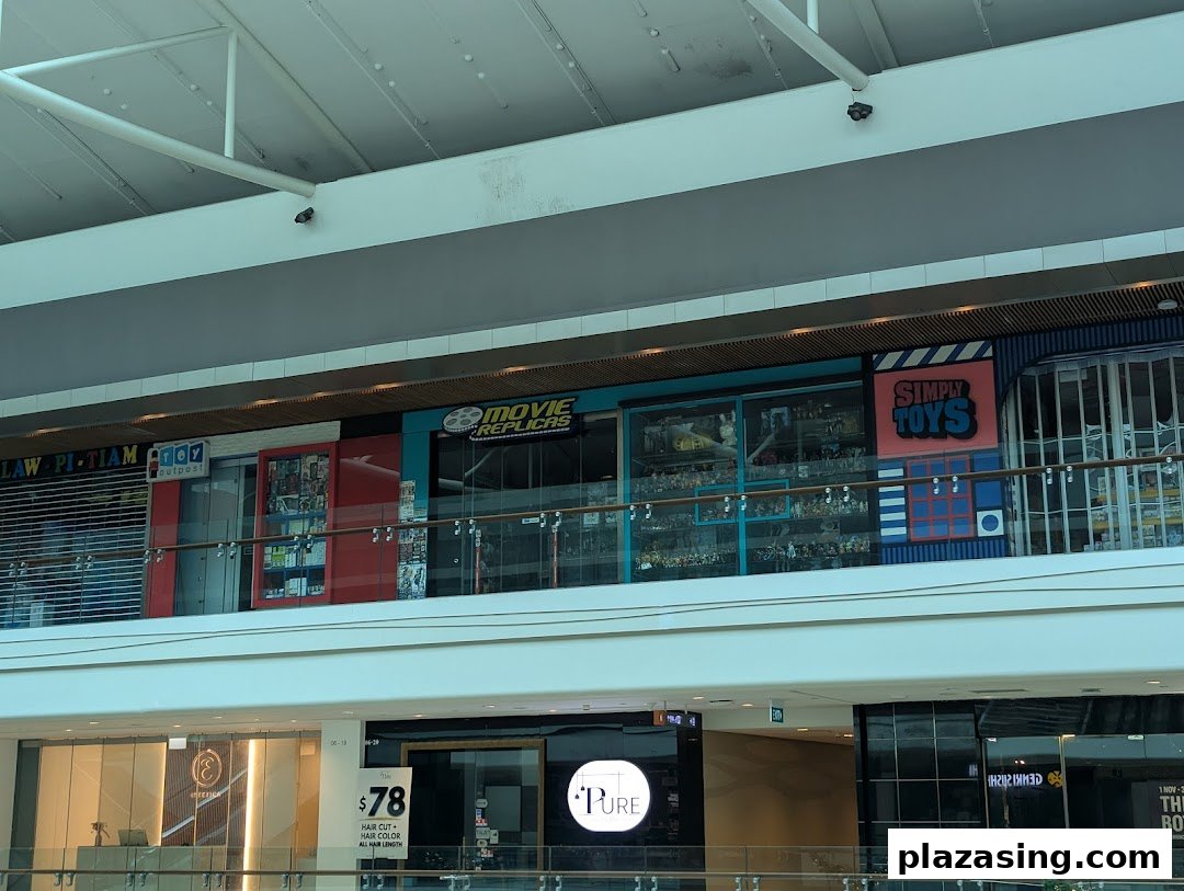 The storefront of Movie Replicas Collection and Simply Toys on an upper level of a shopping mall.