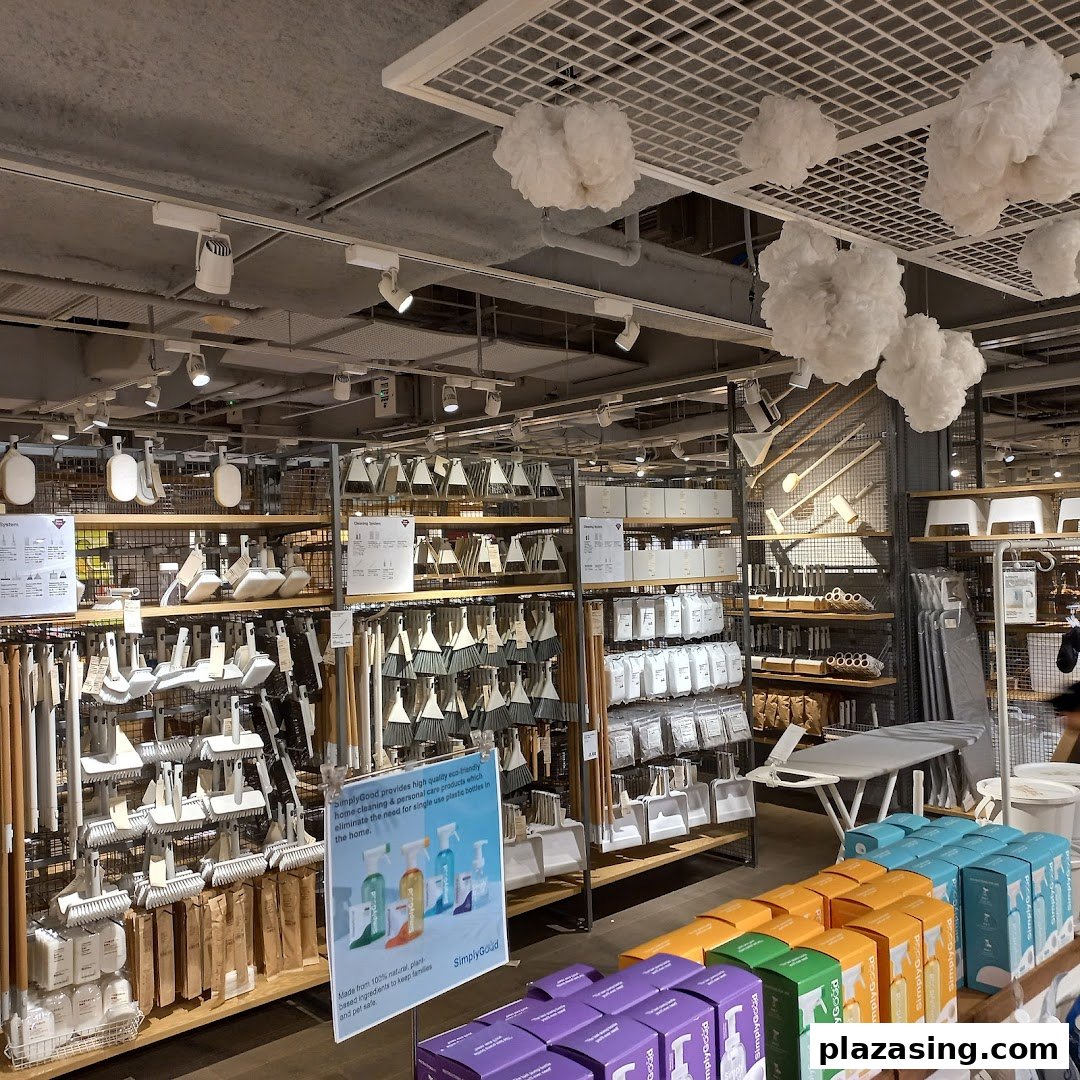 An aisle in MUJI showcasing a wide range of home cleaning tools and eco-friendly products.