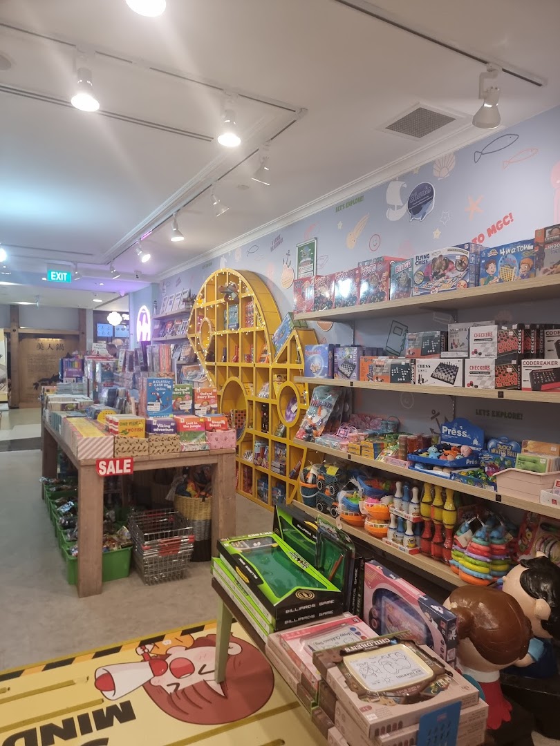 Interior view of a children's shop featuring educational toys, games, and books on display.