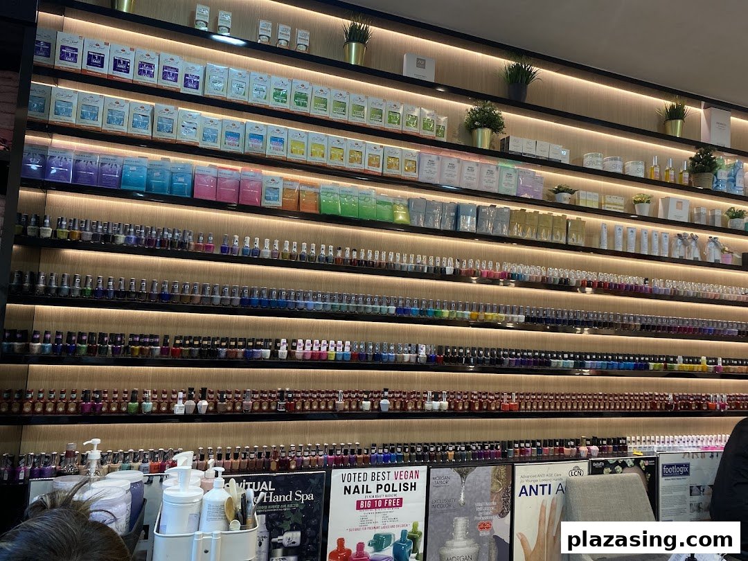A vibrant wall display showcasing a vast collection of nail polishes and spa products at N20 Nail Spa.