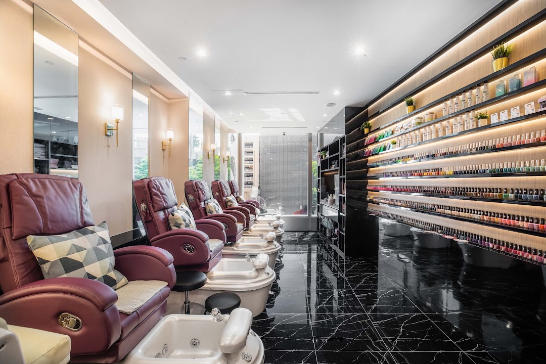 Interior of N20 Nail Spa featuring comfortable pedicure chairs and a vast selection of nail polishes.