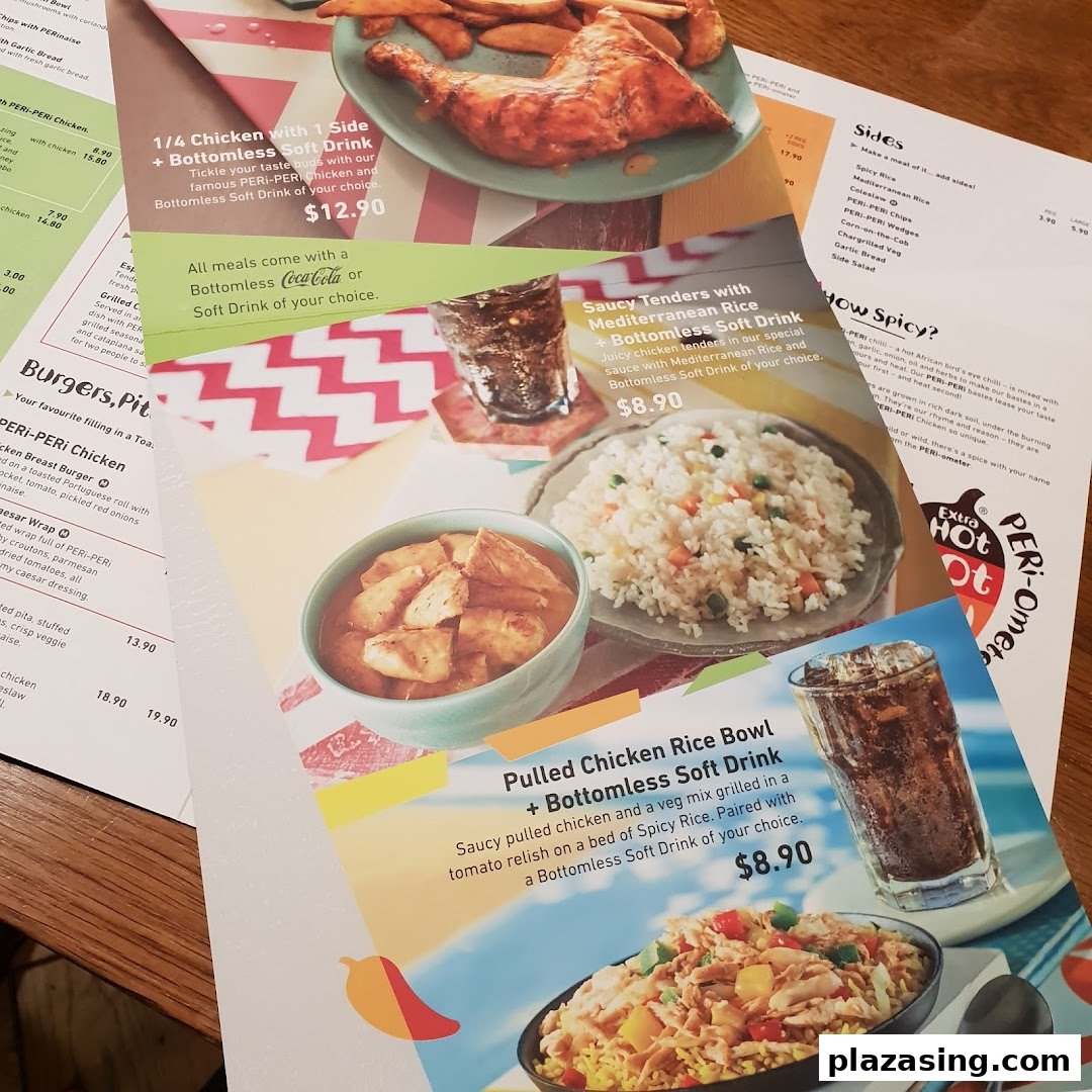A close-up view of a Nando's menu displaying chicken meals, sides, and combo offers with prices.