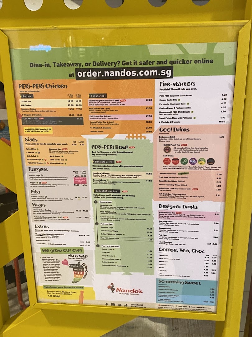 A detailed menu board for Nando's, showcasing their PERi-PERi chicken, sides, bowls, and drinks.
