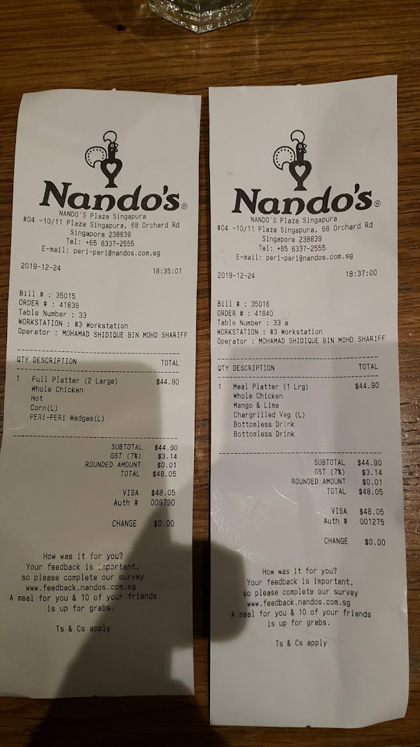 Two Nando's receipts showing details of PERi-PERi chicken orders and customer feedback prompts.