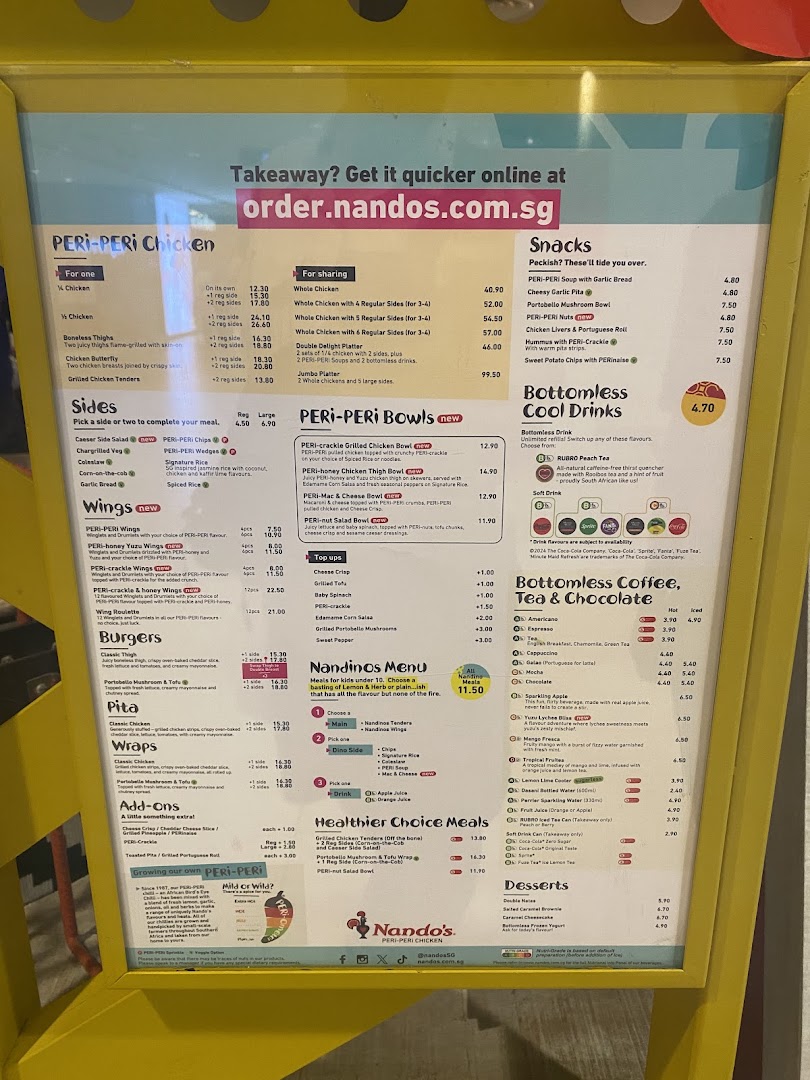 A detailed view of the Nando's menu board displaying flame-grilled PERi-PERi chicken, sides, and drinks.