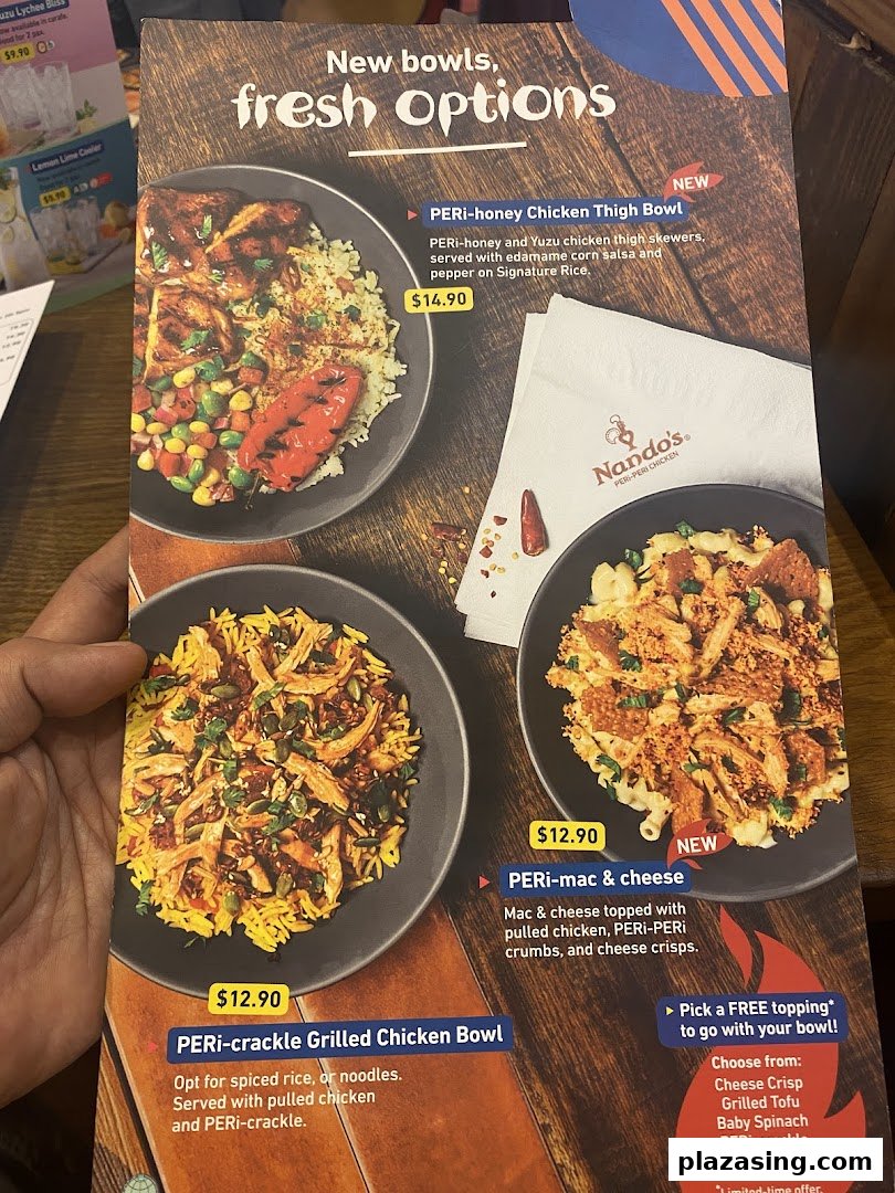 A Nando's menu page showcasing new PERi-PERi chicken bowls and fresh options with prices.