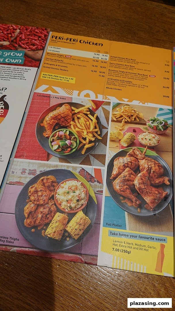 A vibrant Nando's menu showcasing PERi-PERi chicken dishes, sides, and sauces with prices.