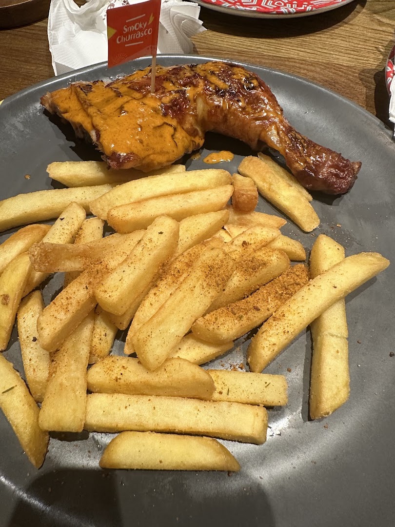Flame-grilled chicken with Smoky Churrasco sauce and seasoned PERi-PERi fries.