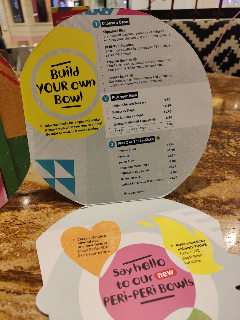 A Nando's menu displaying options for building custom PERi-PERi bowls with bases, mains, and side-kicks.