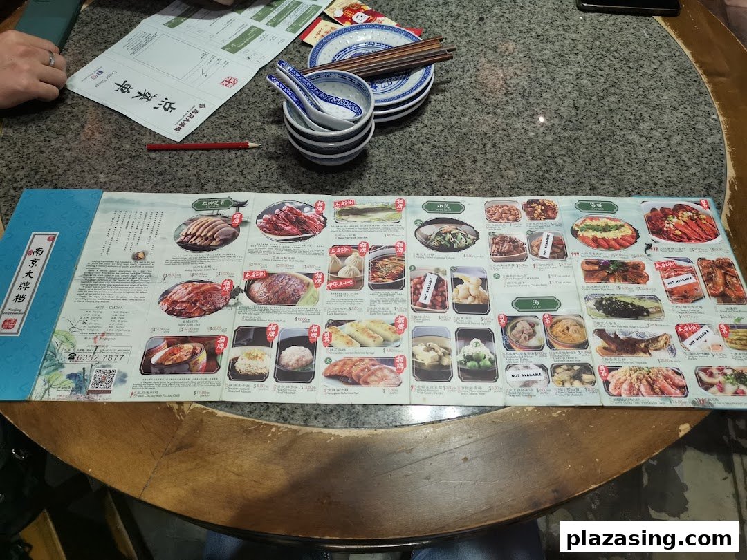A detailed menu from Nanjing Impressions, showcasing a variety of authentic Chinese dishes with images and prices.