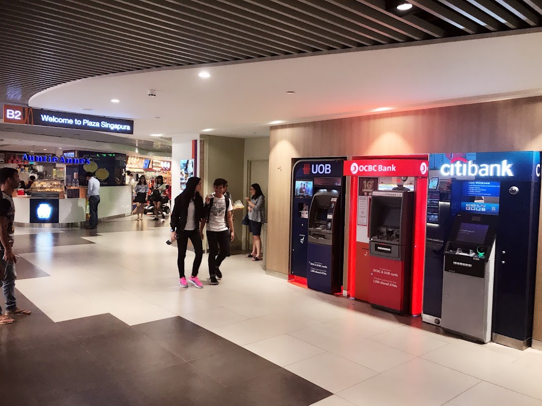 ATMs from UOB, OCBC Bank, and Citibank in a mall corridor.