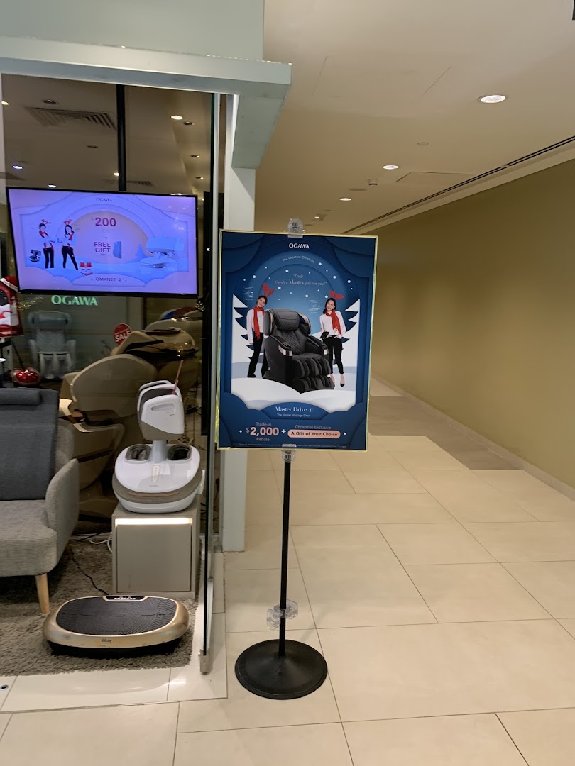 The OGAWA shop front features a display of wellness products and promotional signage for massage chairs.