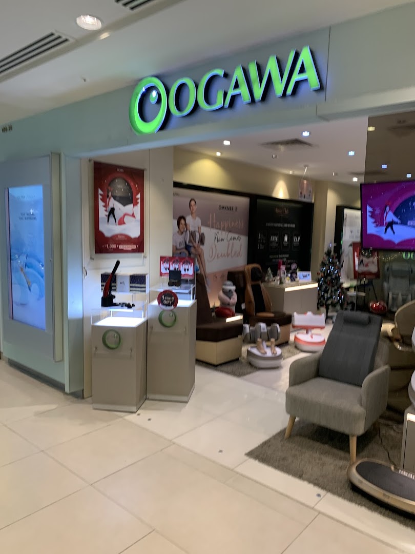 The OGAWA shop entrance showcasing massage chairs and wellness products in a mall setting.