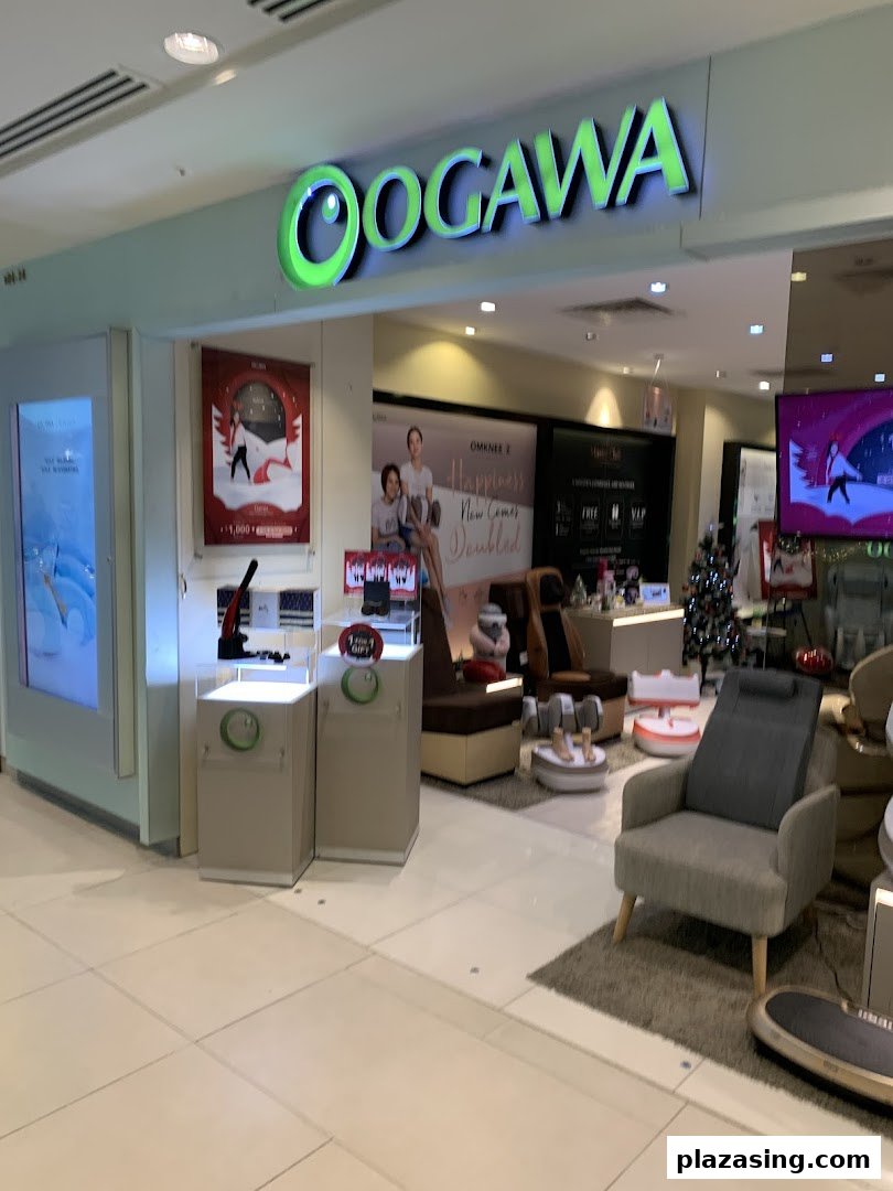 The OGAWA shop entrance showcasing massage chairs and wellness products in a mall setting.