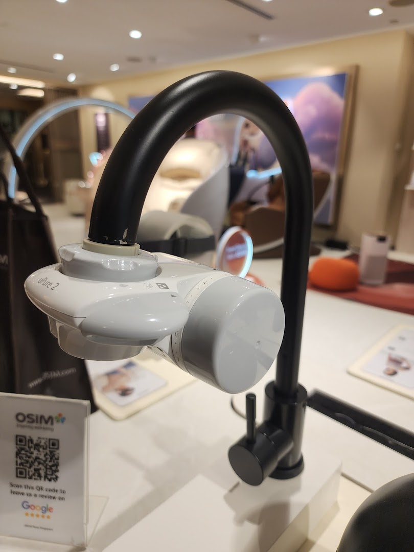 An OSIM uPure 2 water purifier on display, showcasing innovative wellness technology.
