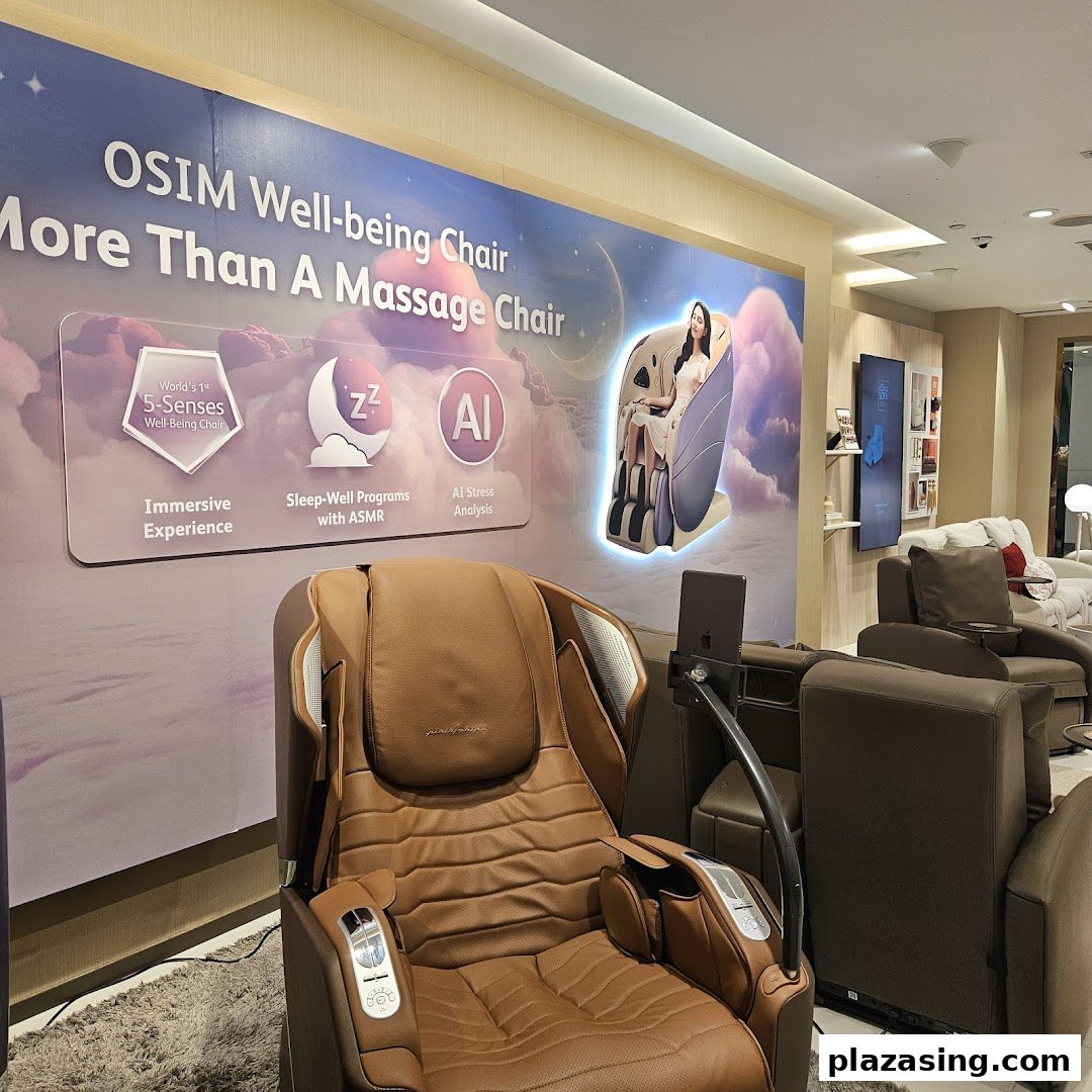 An OSIM store interior showcasing a brown massage chair and a promotional display for the 'Well-being Chair'.