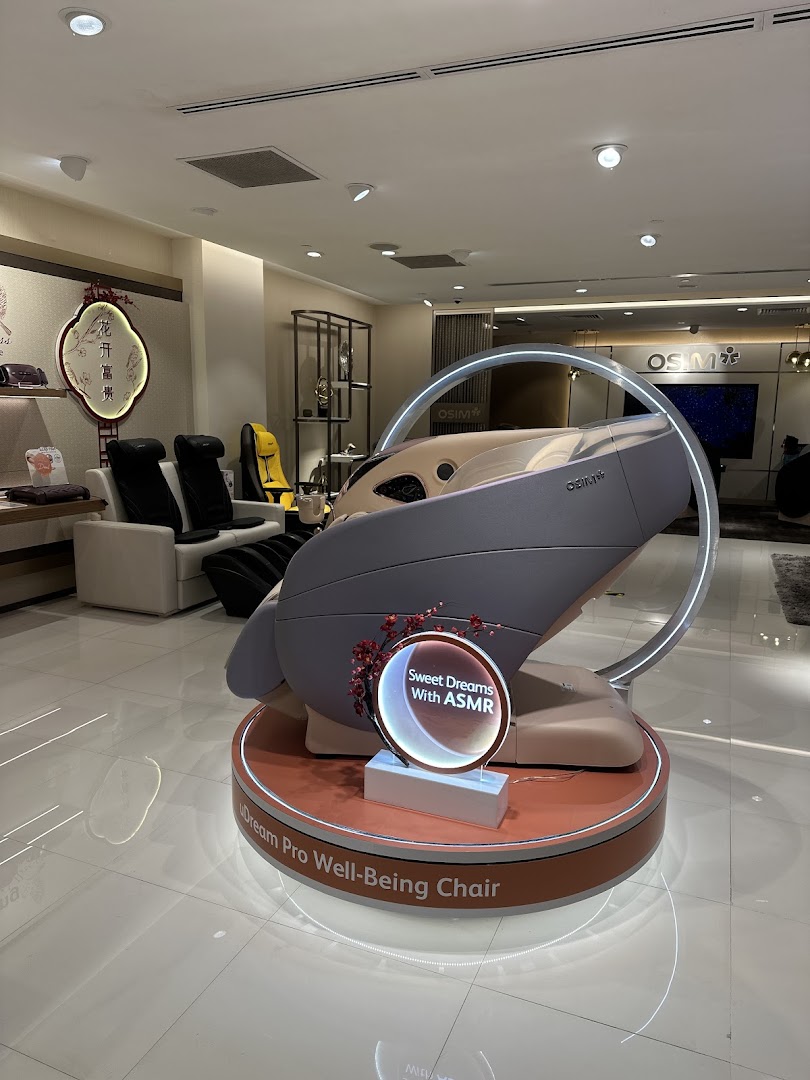 Interior view of OSIM store showcasing various massage chairs, including the uDream Pro Well-Being Chair.