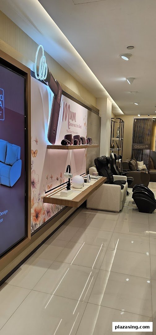Interior view of OSIM Plaza Singapura, showcasing wellness products and massage chairs.