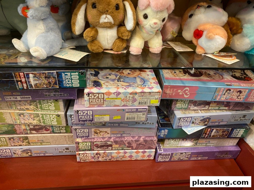 A display of anime-themed jigsaw puzzles and plush toys inside Otaku House.
