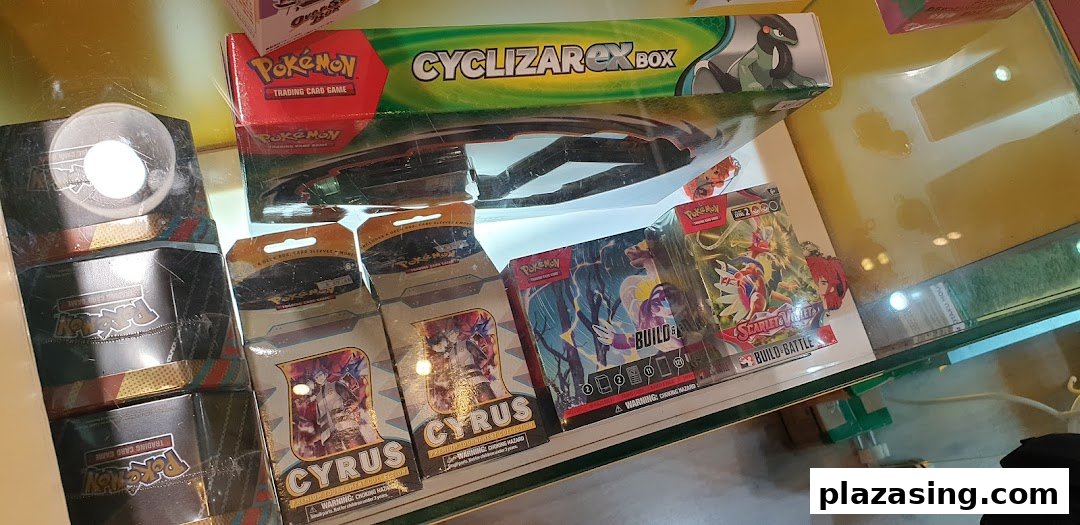 A display case filled with Pokémon Trading Card Game products and other card game items.