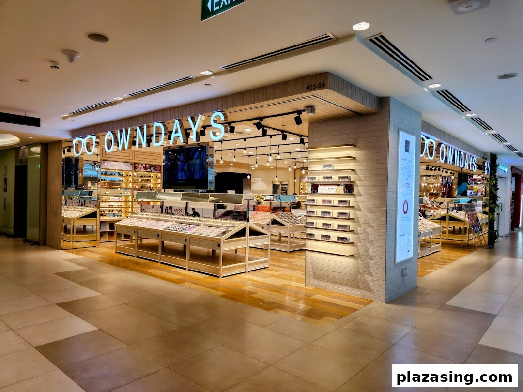 A brightly lit OWNDAYS eyewear store interior with numerous glasses displays and a welcoming entrance.