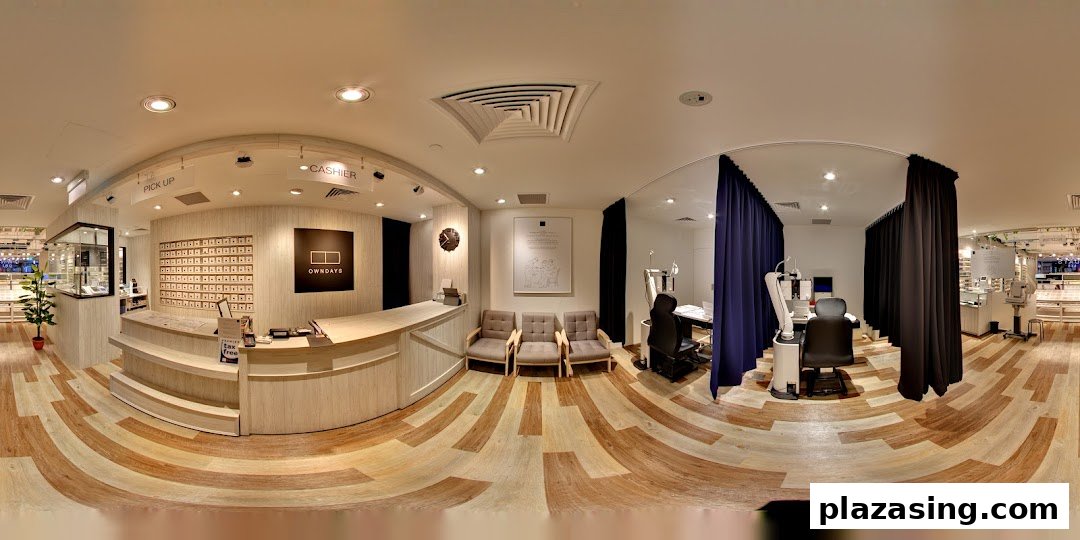 A panoramic view of the modern and well-equipped interior of OWNDAYS optical shop.