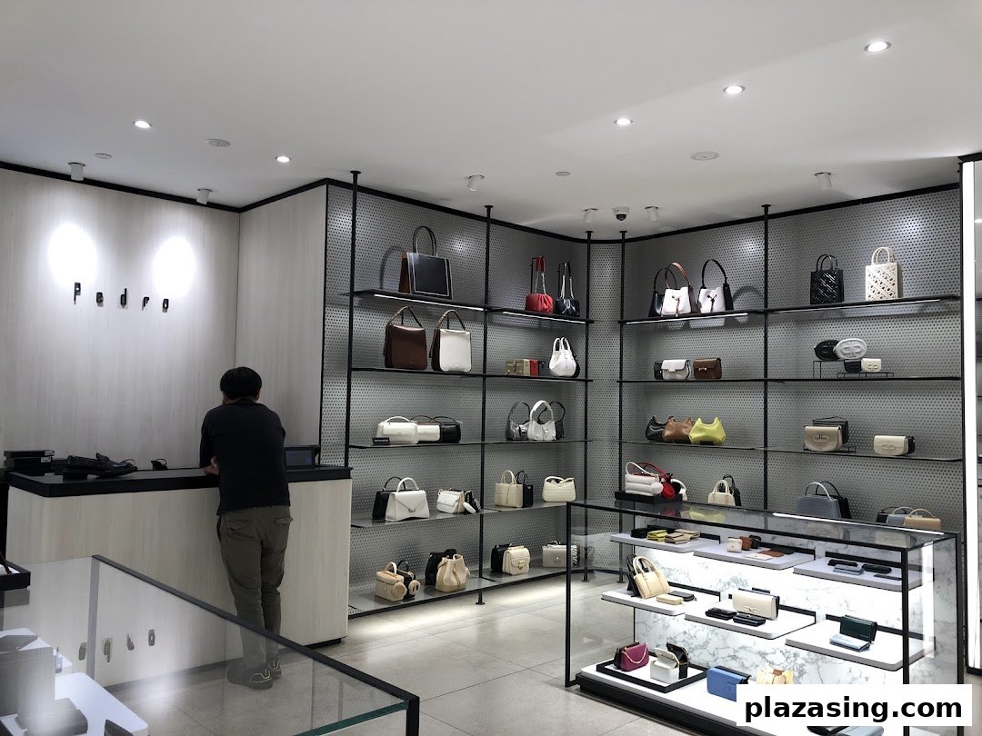 Interior view of PEDRO store showcasing a wide range of stylish bags and accessories on display shelves.