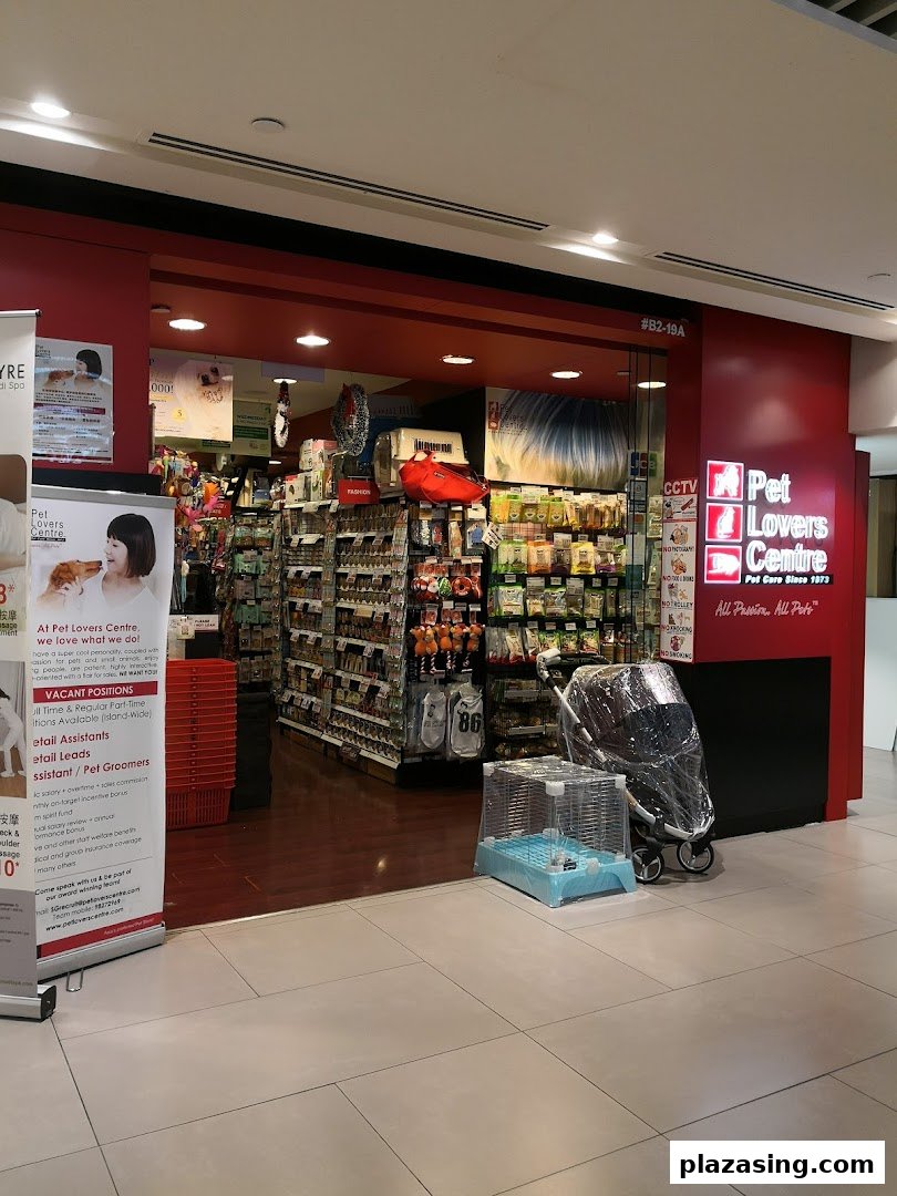Entrance of Pet Lovers Centre, a pet supply store, showcasing various pet products and accessories.