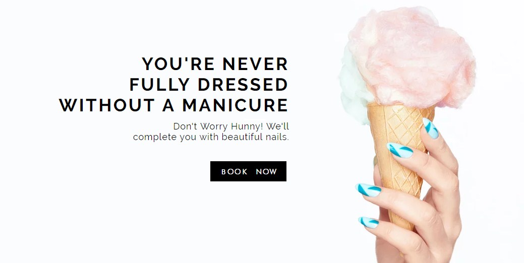 A hand with stylish blue manicured nails holds a cotton candy cone, alongside promotional text for manicures.