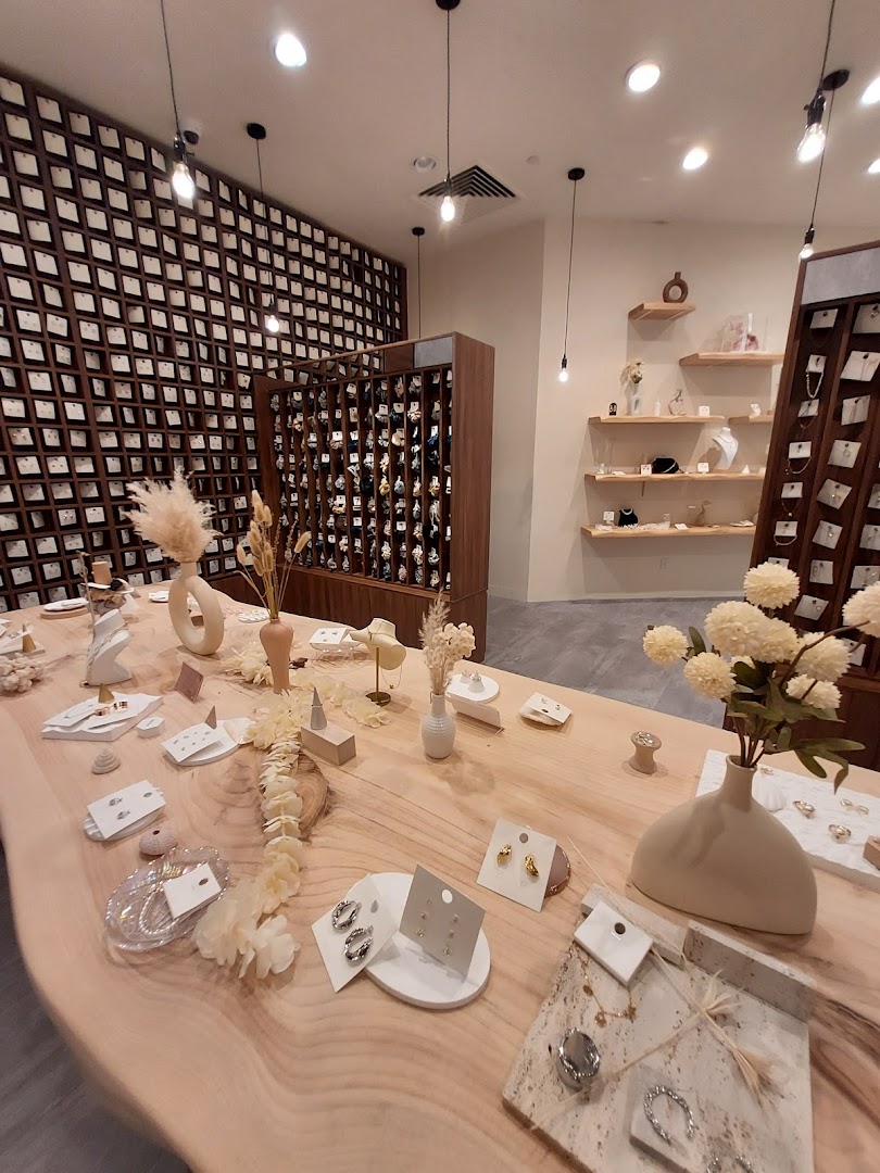 Interior view of Playdress, showcasing a wide array of stylish jewelry and accessories on display.