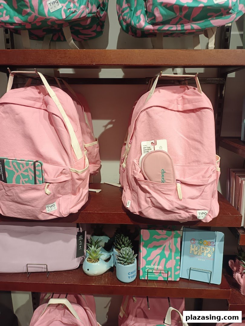 Pink backpacks, stationery, and decor items displayed on Typo shelves.