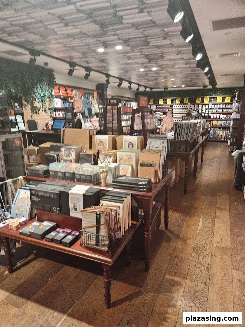 Interior view of Typo, showcasing stationery, gifts, and creative supplies on display tables and shelves.